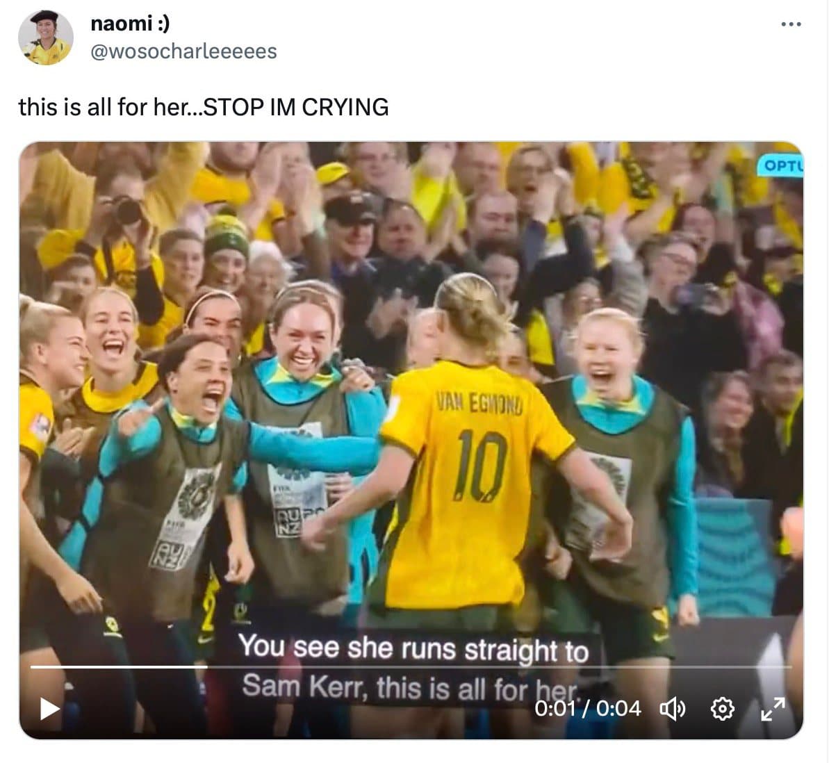 Emily van Egmond running into the arms of Sam Kerr, with a caption on the screen reading 'This is all for her'