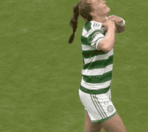 Celtic's Caitlin Hayes looking to the sky and resisting the temptation to cry into her shirt
