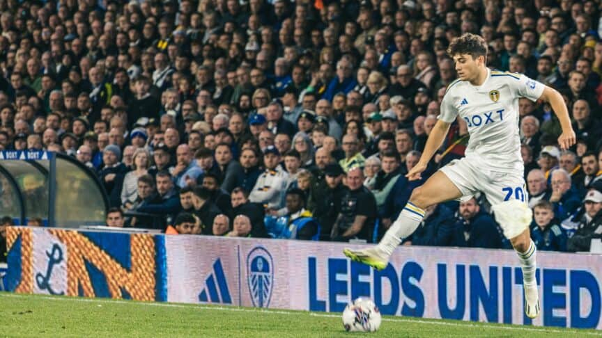 Dan James is airborne in front of the West Stand, about to trap the ball, he looks cool here