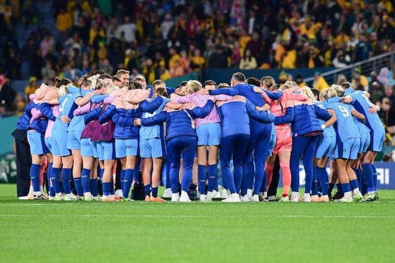 England players huddle after World Cup final defeat