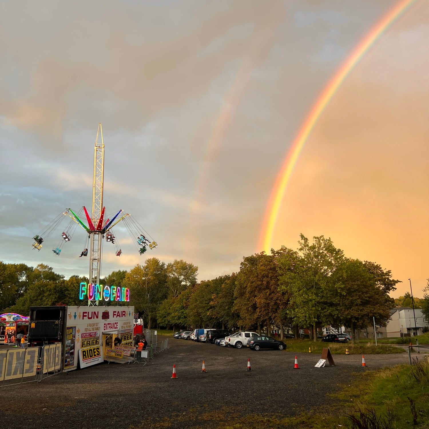 Hannah Platt's photograph, Woodhouse Moor funfair — there's a double rainbow for crying out loud!