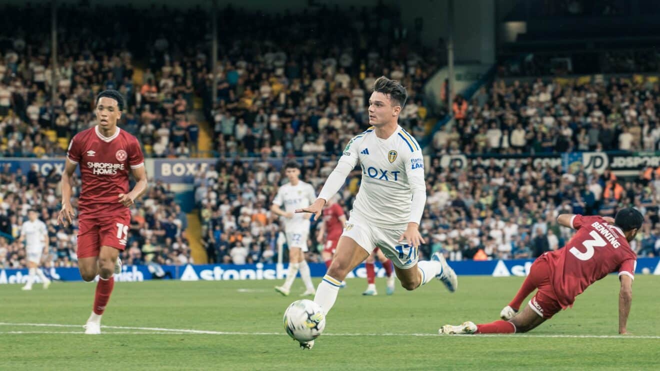 Jamie Shackleton with the ball at his feet against Shrewsbury, looking like he's having a great time