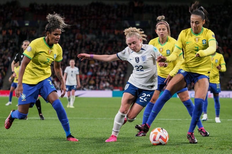 Katie Robinson trying to find some space, but there are three Brazil players coming in and they're nicking the ball, dammit