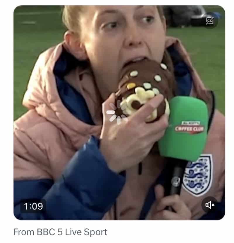 Keira Walsh eating a big cake shaped like a caterpillar