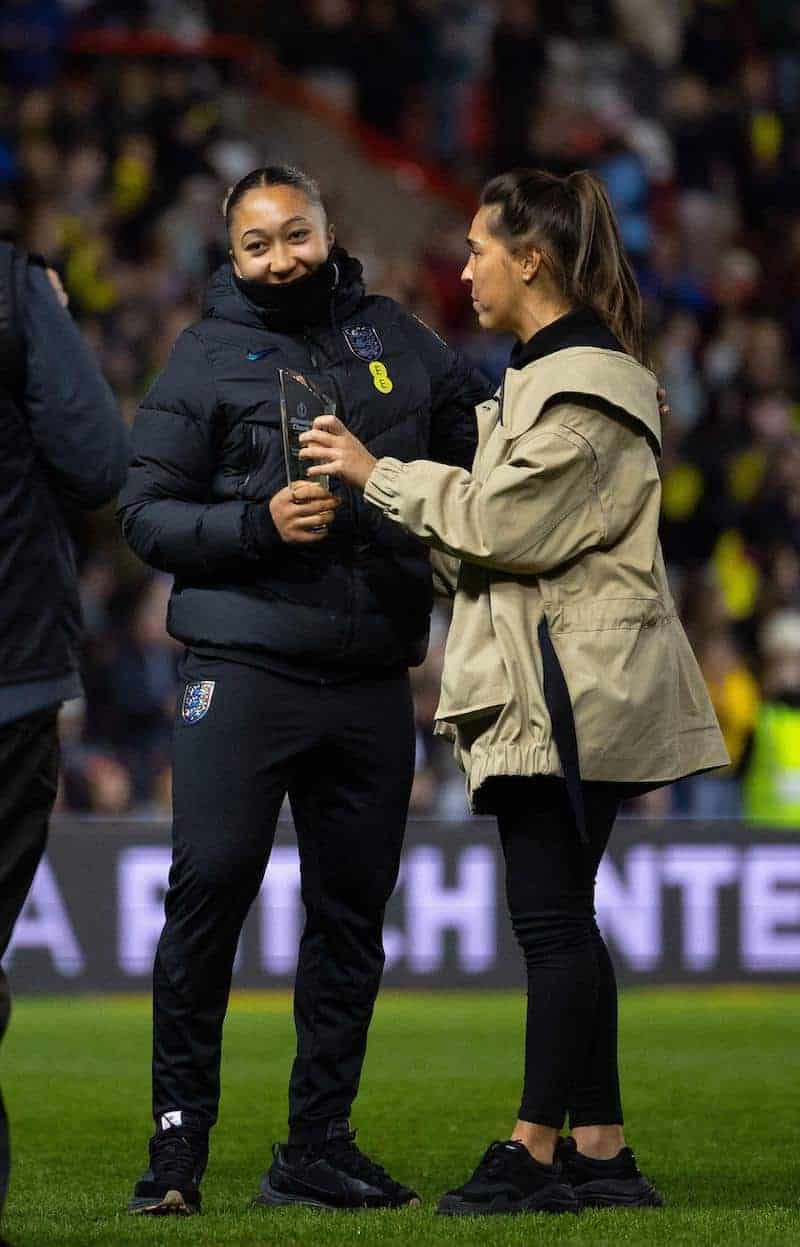 Lauren James collects her player of the tournament award in a snood