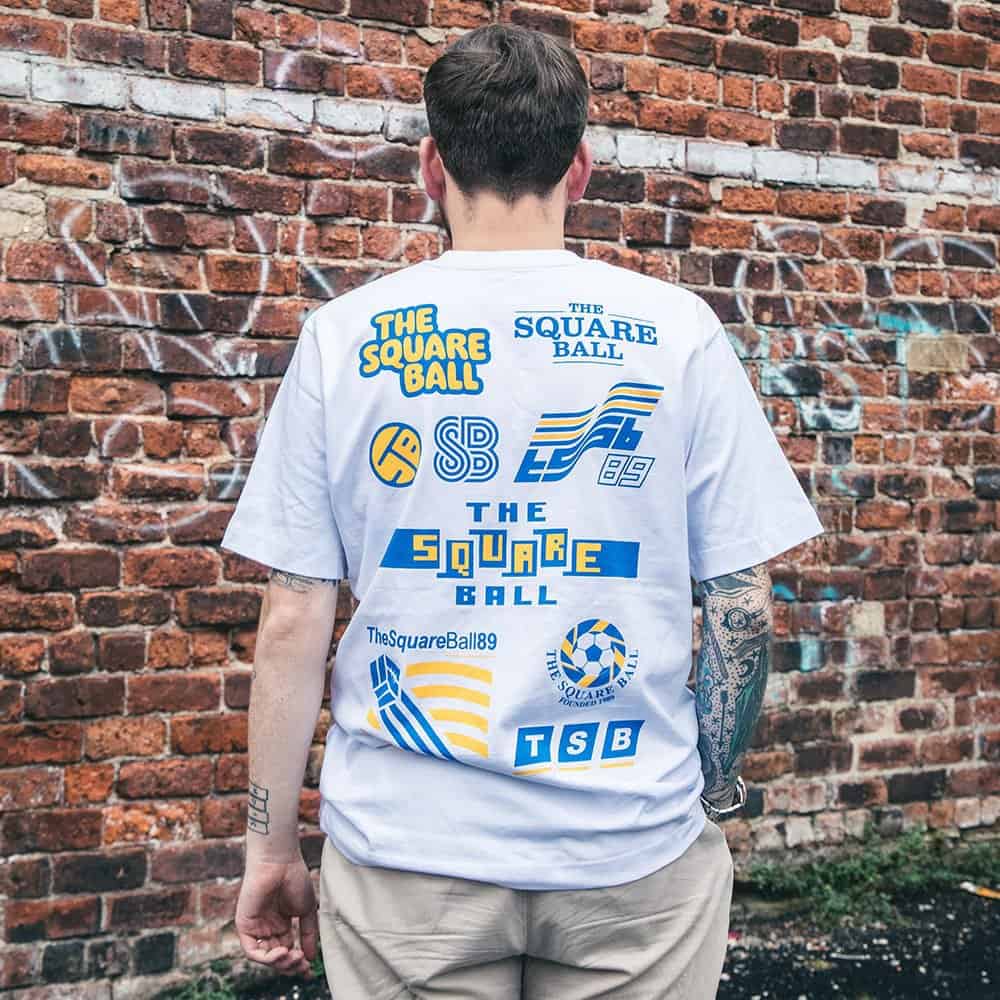 A photograph of the back of the new TSB retrofit logos t-shirt, featuring nine new TSB logos that may or may not have been ripped off from other brands. Let's just say they're inspired