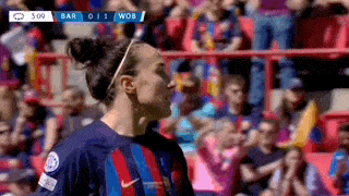 Lucy Bronze adjusts her hairband