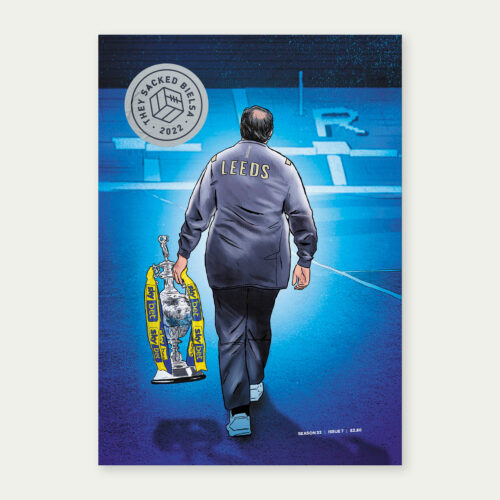 The cover of TSB 21/22 issue 7, featuring Marcelo Bielsa with the Championship trophy in his hand, walking away