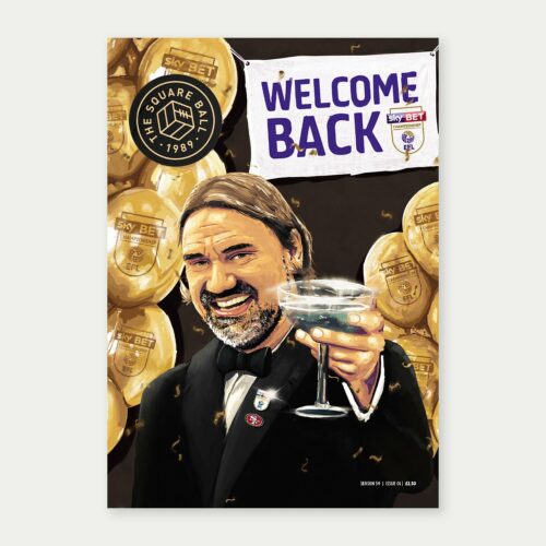 The front cover of TSB 23-24 issue 01, with artwork by Lee Shackleton showing Daniel Farke raising a champagne glass to the viewer, with a banner reading 'Welcome back' and balloons featuring the Championship logo