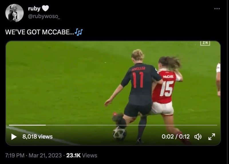 Screenshot of a tweet showing Arsenal's Katie McCabe somehow turning a penalty box lunge into the smoothest tackle