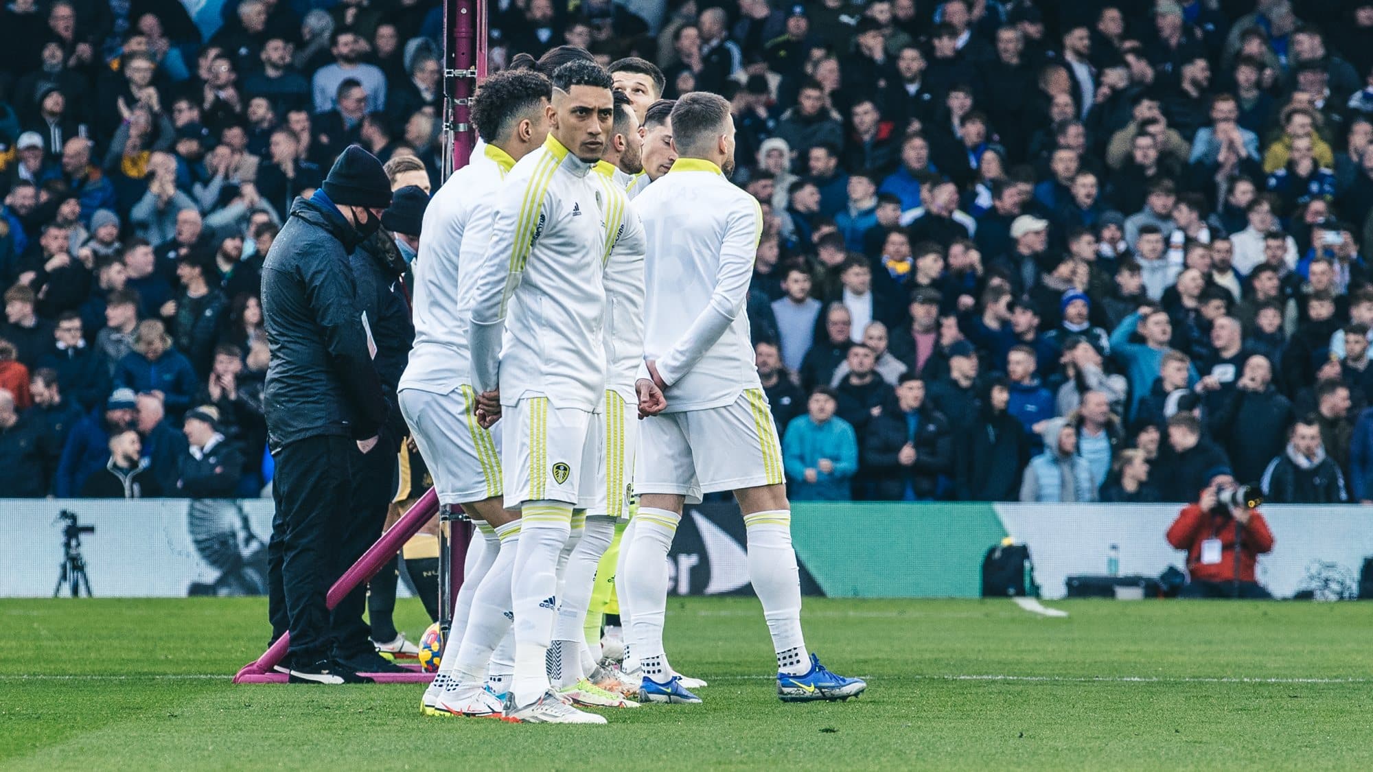 Raphinha staring angrily at something while Leeds line up before playing Newcastle, he must hate that Premier League anthem as much as everyone else