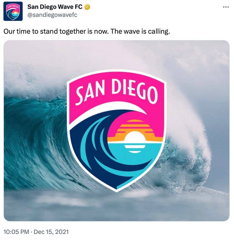 The tweet unveiling San Diego Wave's pacific coast sunset logo, placed on a big photo of a cresting wave