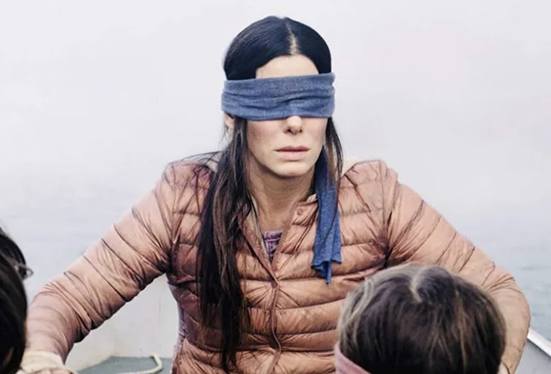 It's the meme where Sandra Bullock is blindfolded