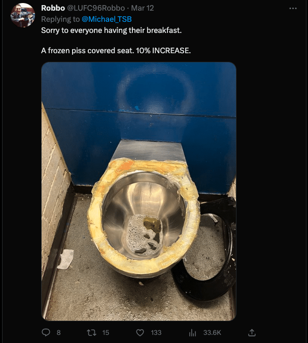 A tweet of a photo of a toilet at Elland Road with a broken seat on the floor next to it and piss all around the rim that is either frozen or has combined with adhesive where someone has tried to glue the seat back on