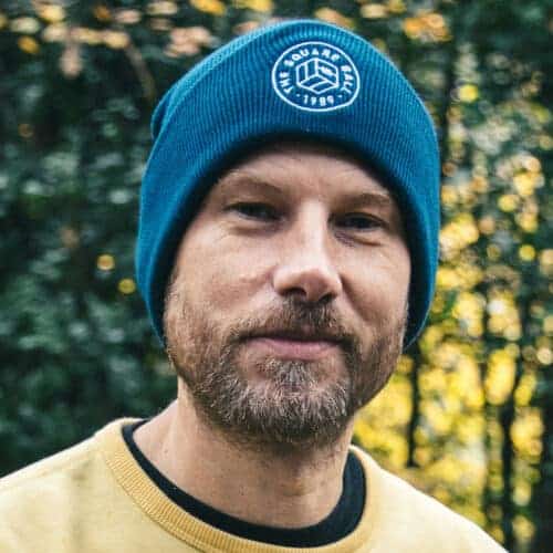 Simon Rix of Kaiser Chiefs wearing a TSB logo beanie in petrol blue