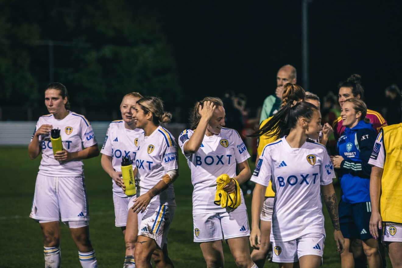 Leeds United Women walking off the pitch at Garforth celebrating beating FC United of Manchester