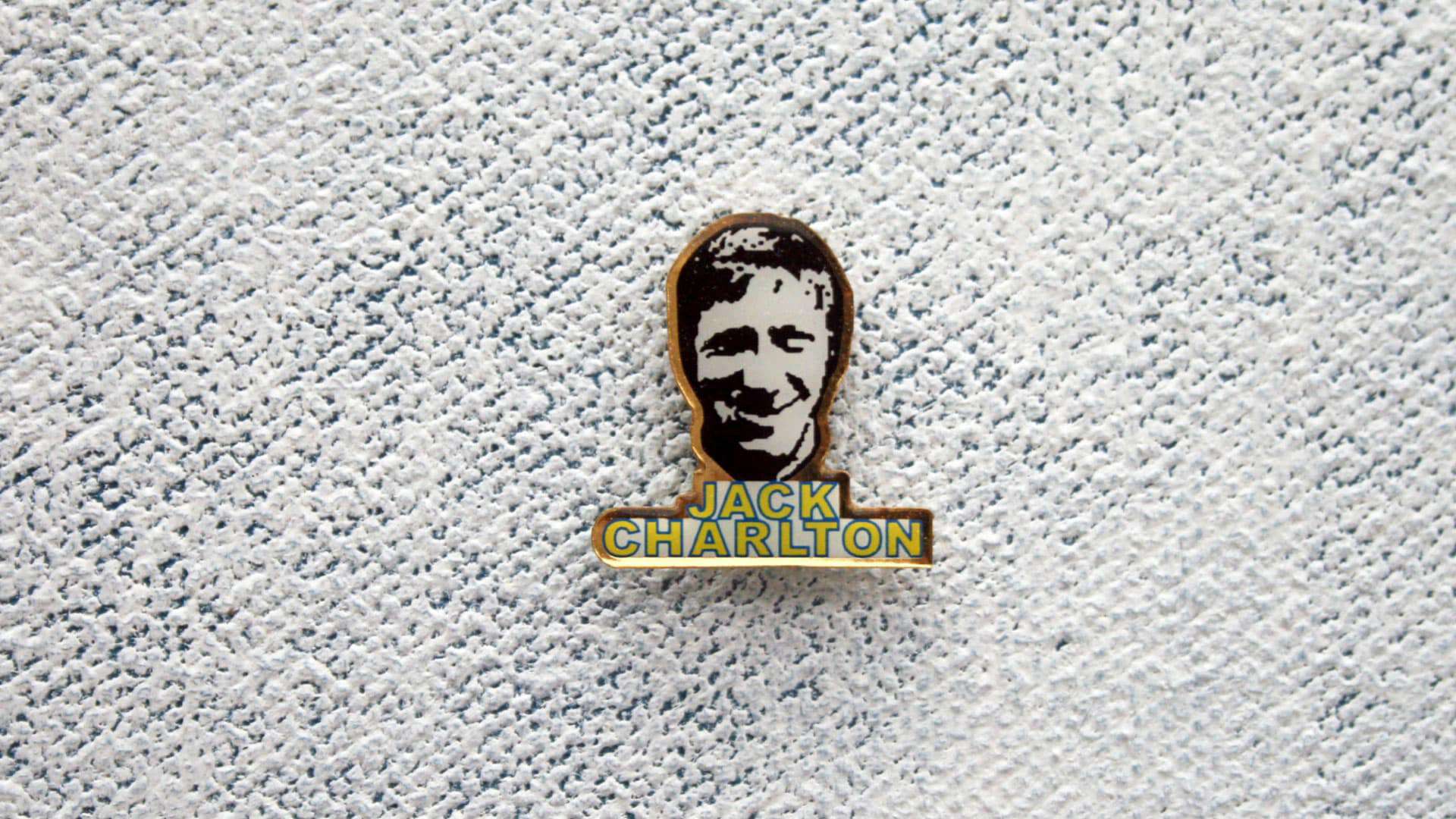 A pin badge of Jack Charlton looking ace