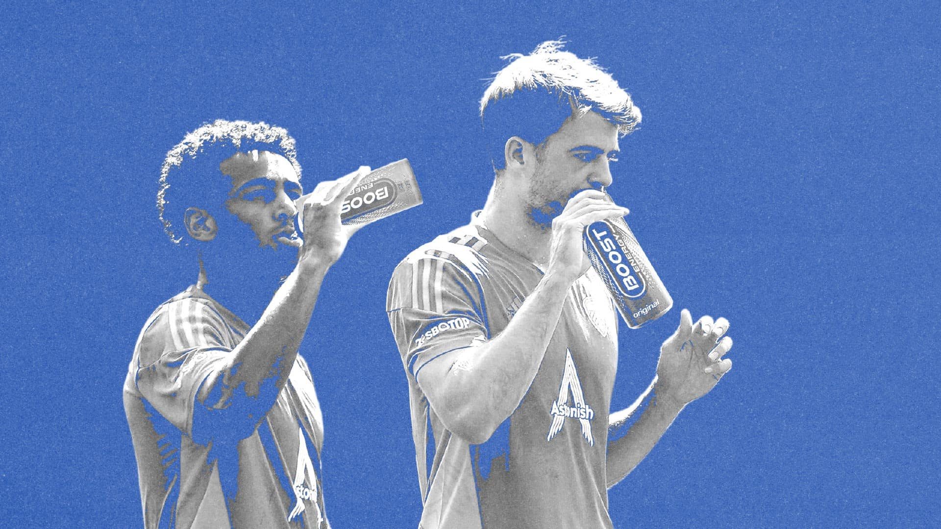 Tyler Adams and Patrick Bamford drinking bottles of Leeds United's favourite brand of highly caffeinated piss, Boost. At least it's not Red Bull