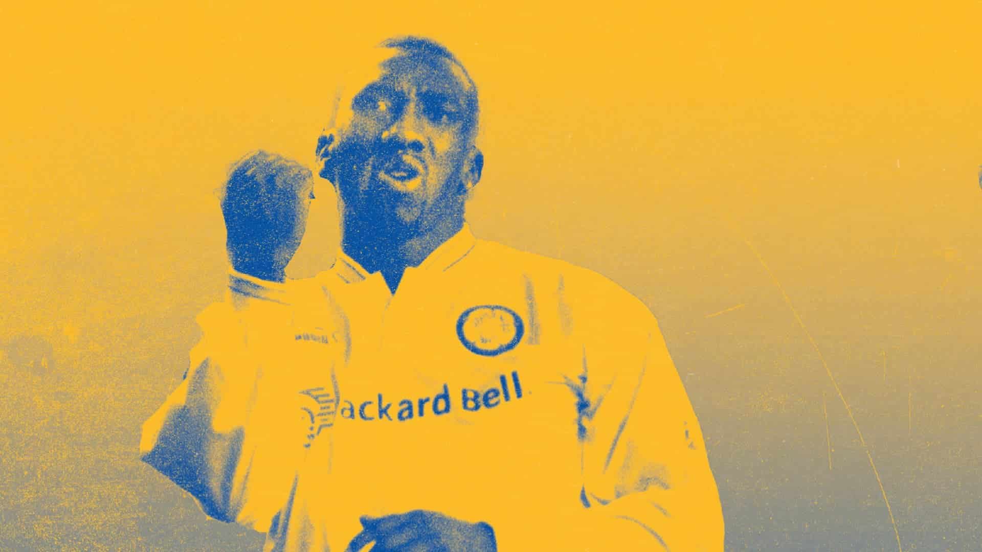 Jimmy Floyd Hasselbaink shaking his first in celebration, either that or he's calling someone a wanker