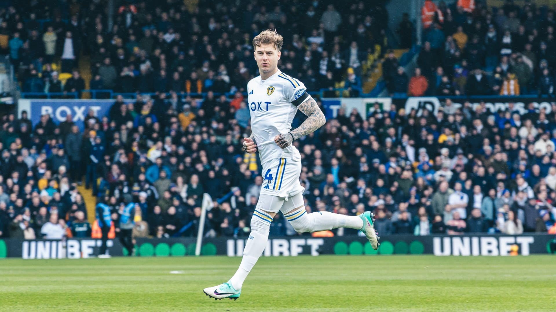 Joe Rodon striding across the pitch before the game with Preston