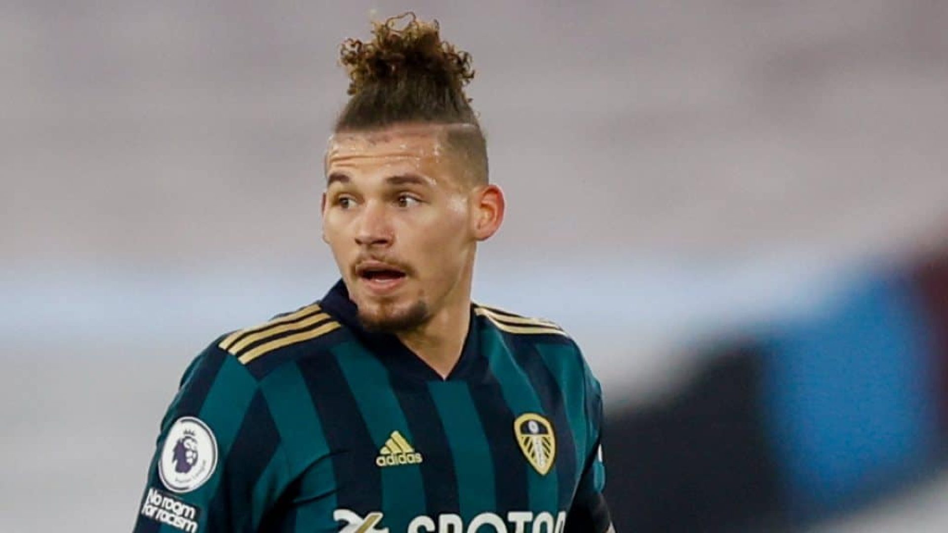 A photo of Kalvin Phillips in the green and blue striped Leeds shirt