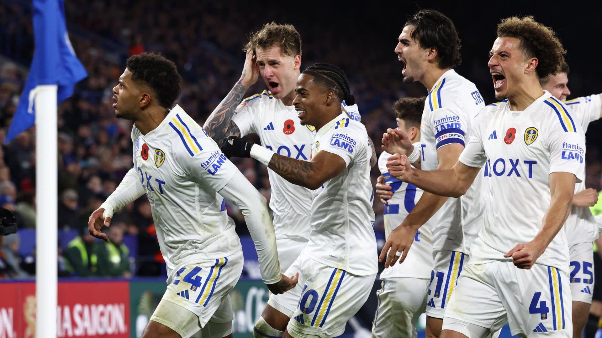 It's pretty much the whole damn Leeds team, led by Georginio Rutter, celebrating the goal at Leicester