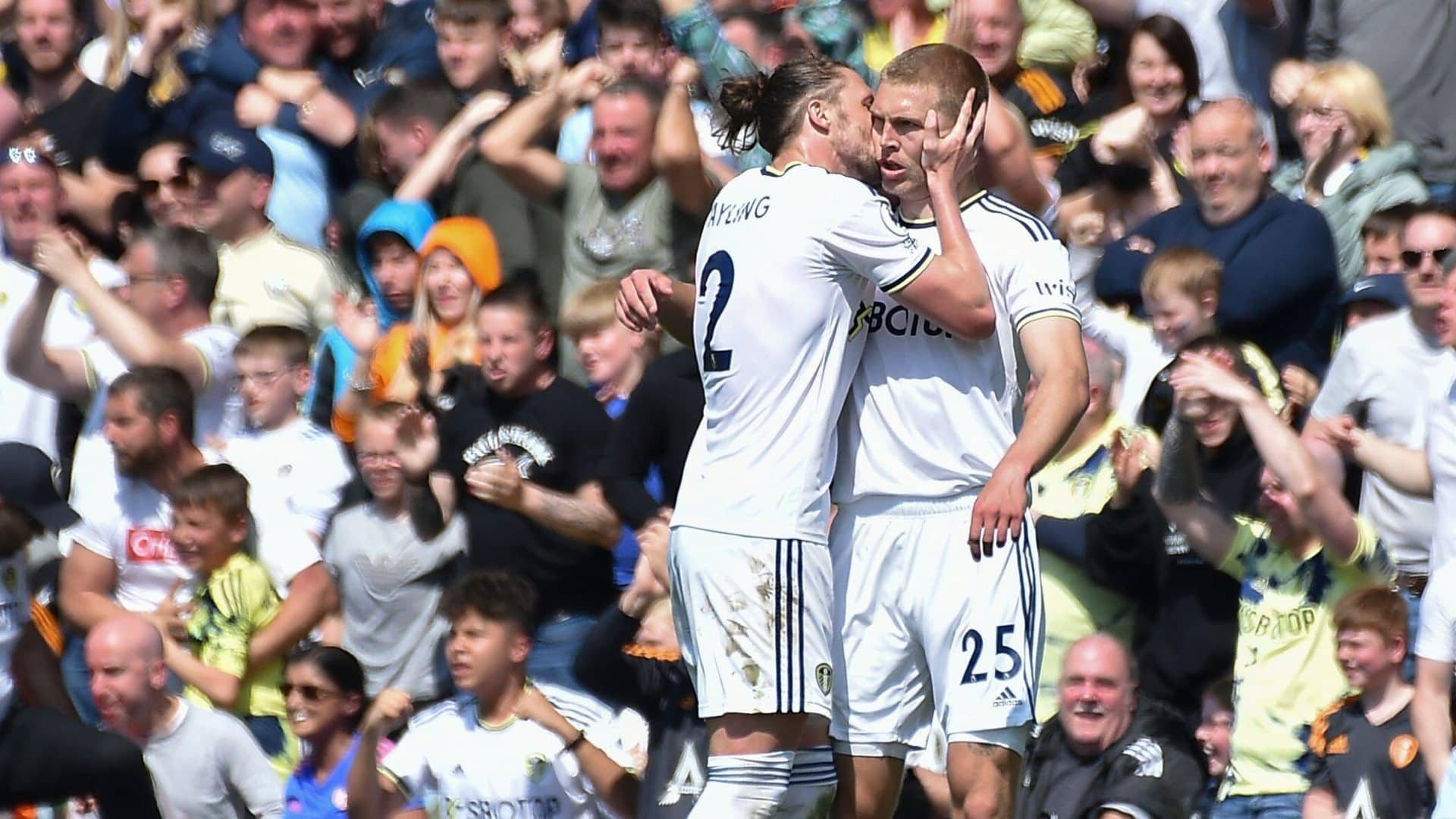 After his goal against Newcastle, Rasmus Kristensen gets a big kiss from Luke Ayling