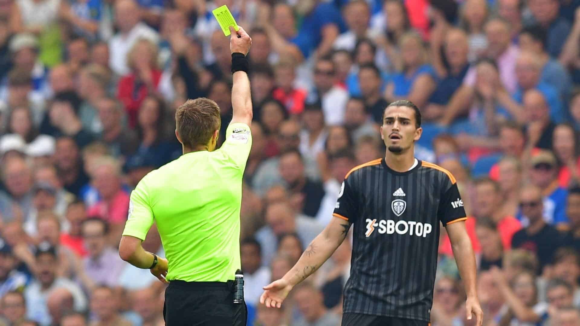 Pascal Struijk gets a yellow card at Brighton. We do not like this ref