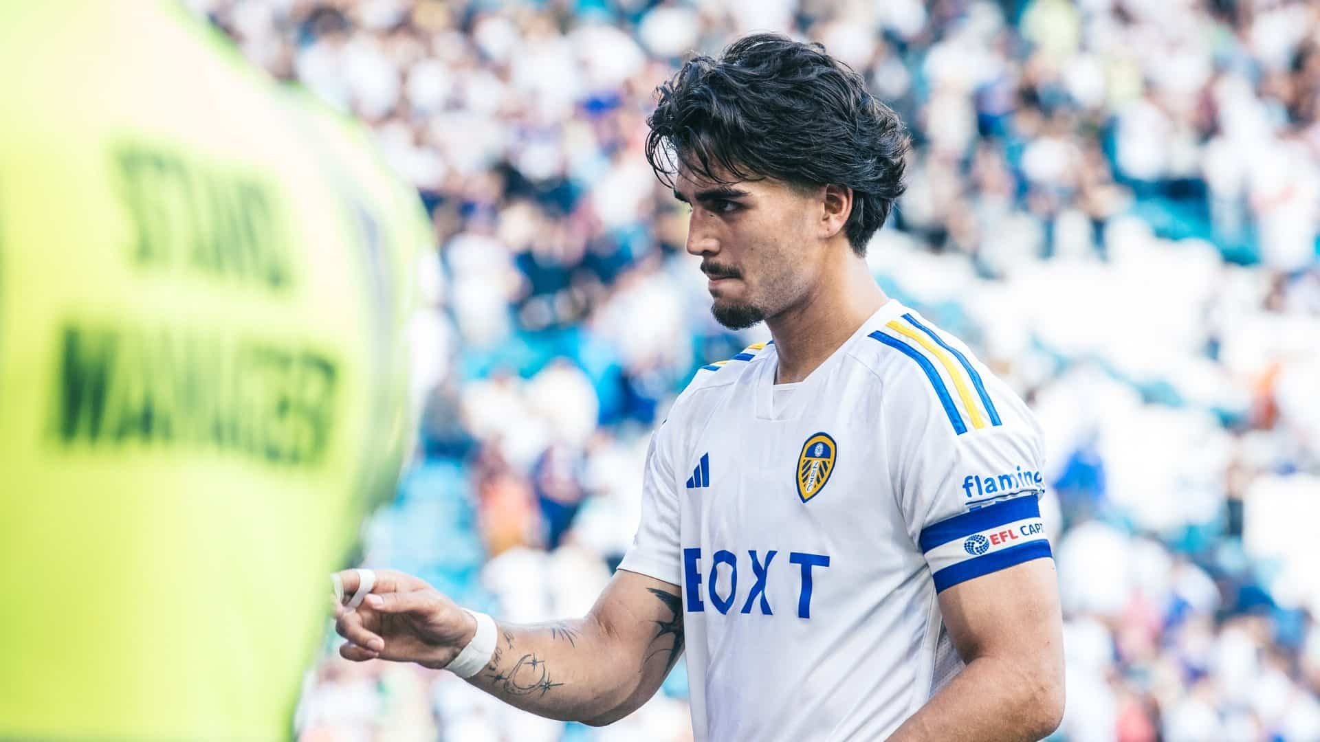 Pascal Struijk, wearing the captain's armband, looking like possibly our most sultry skipper yet as he speaks to fans after the game
