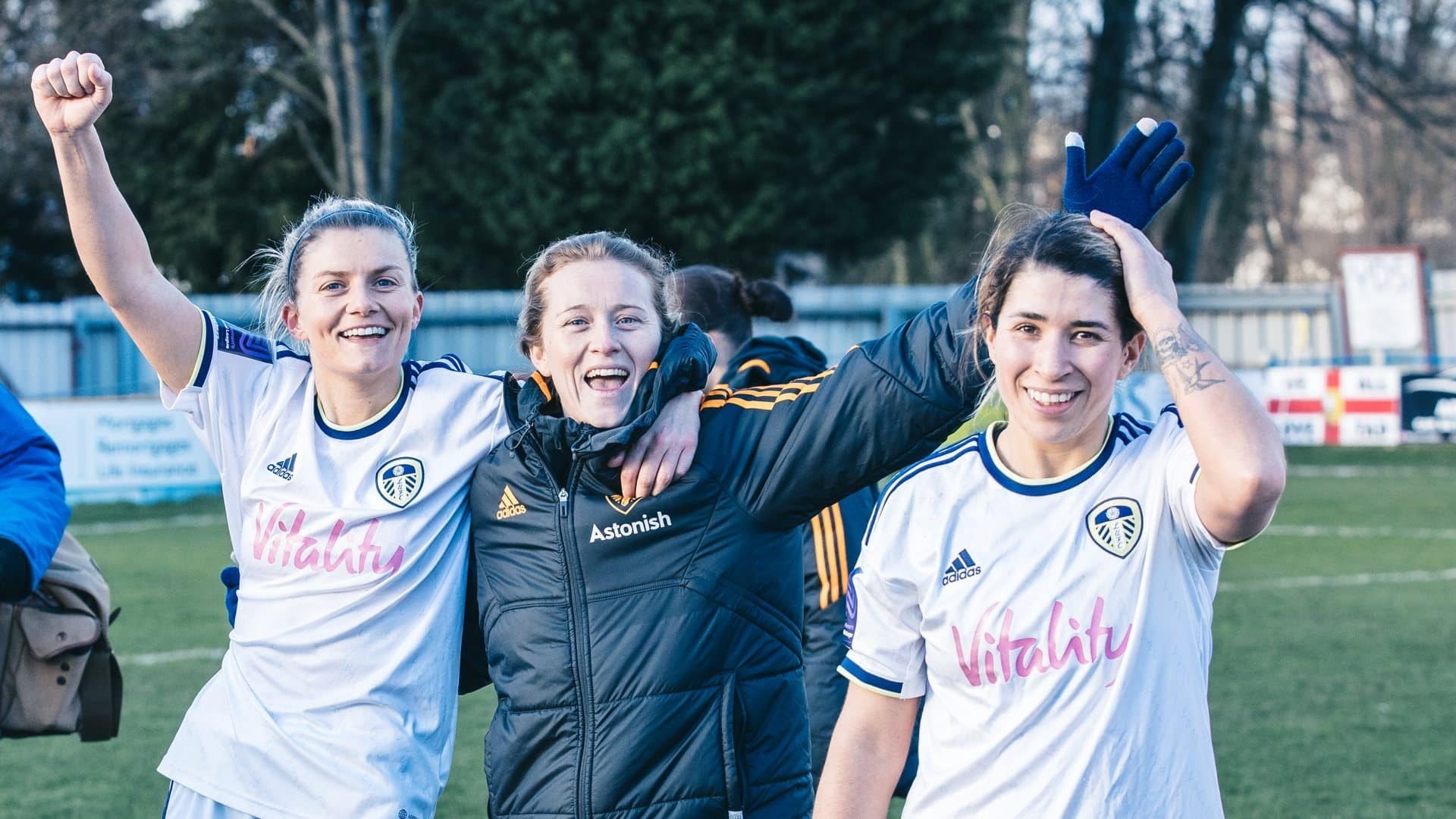 Rebekah Bass (centre) celebrating Leeds FAWNL Plate semi-final win over Southampton