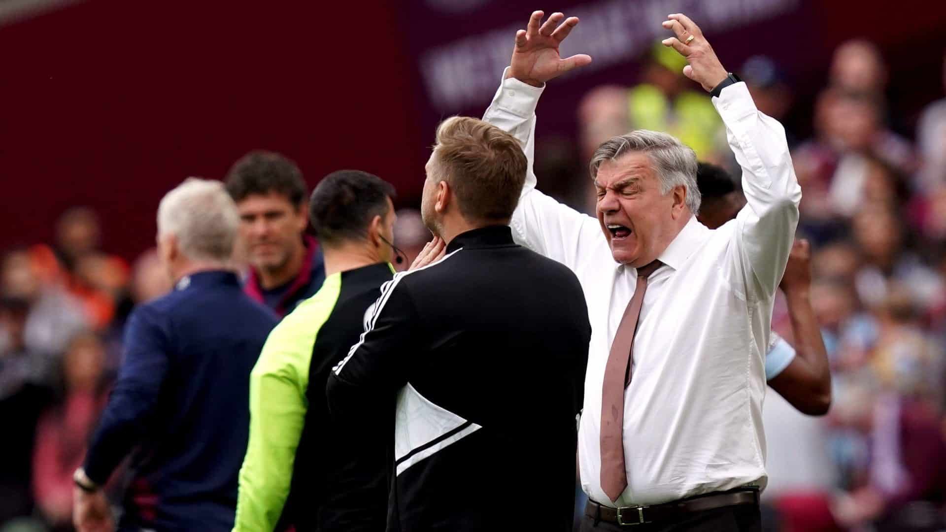 Sam Allardyce in his shirt sleeves at West Ham, raising his arms above his head and shouting and grimacing as if he's about to sink his angry teeth into Karl Robinson's necl