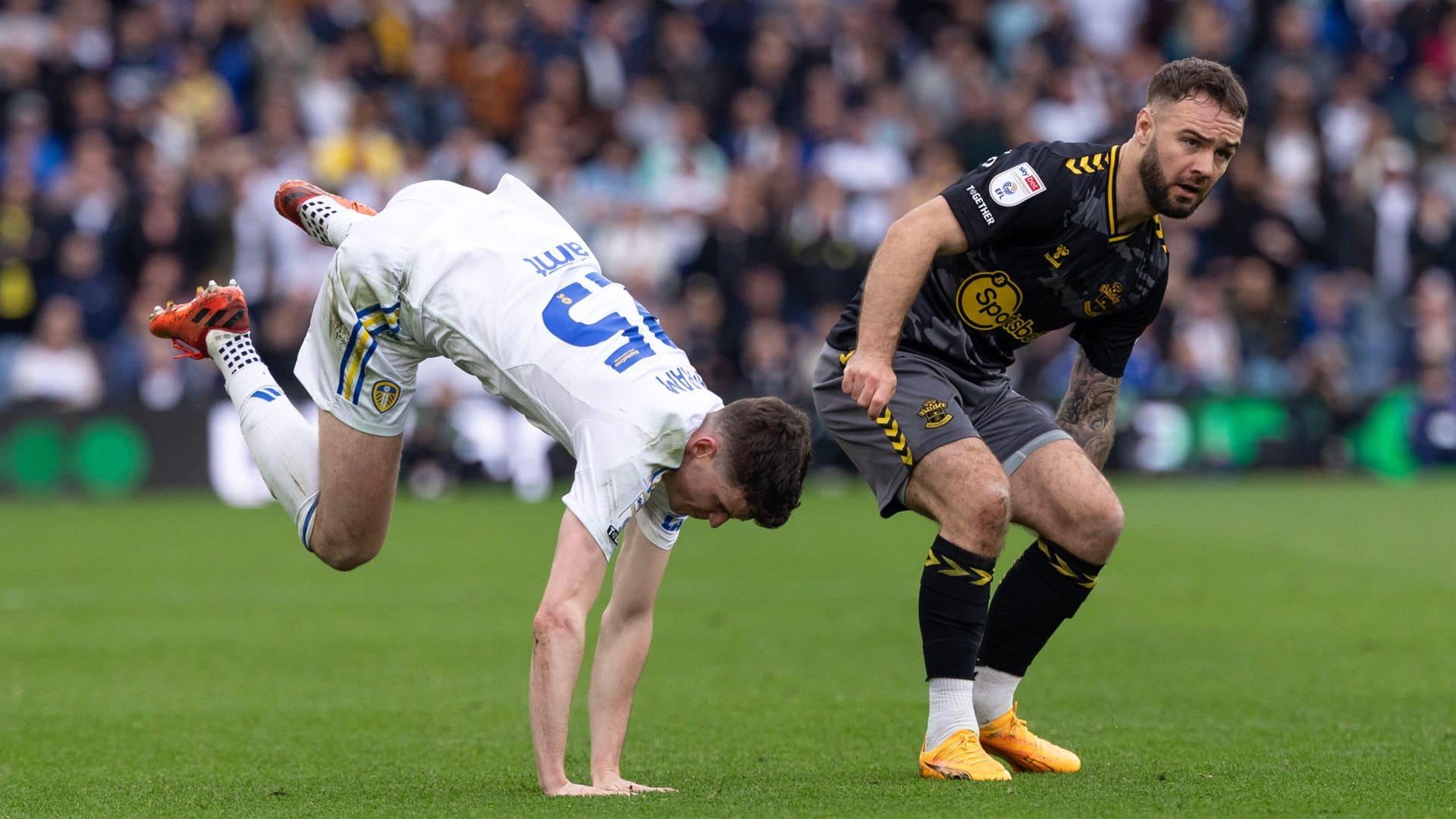 Sam Byram doing what would be a pretty impressive hand-spring if he was breakdancing