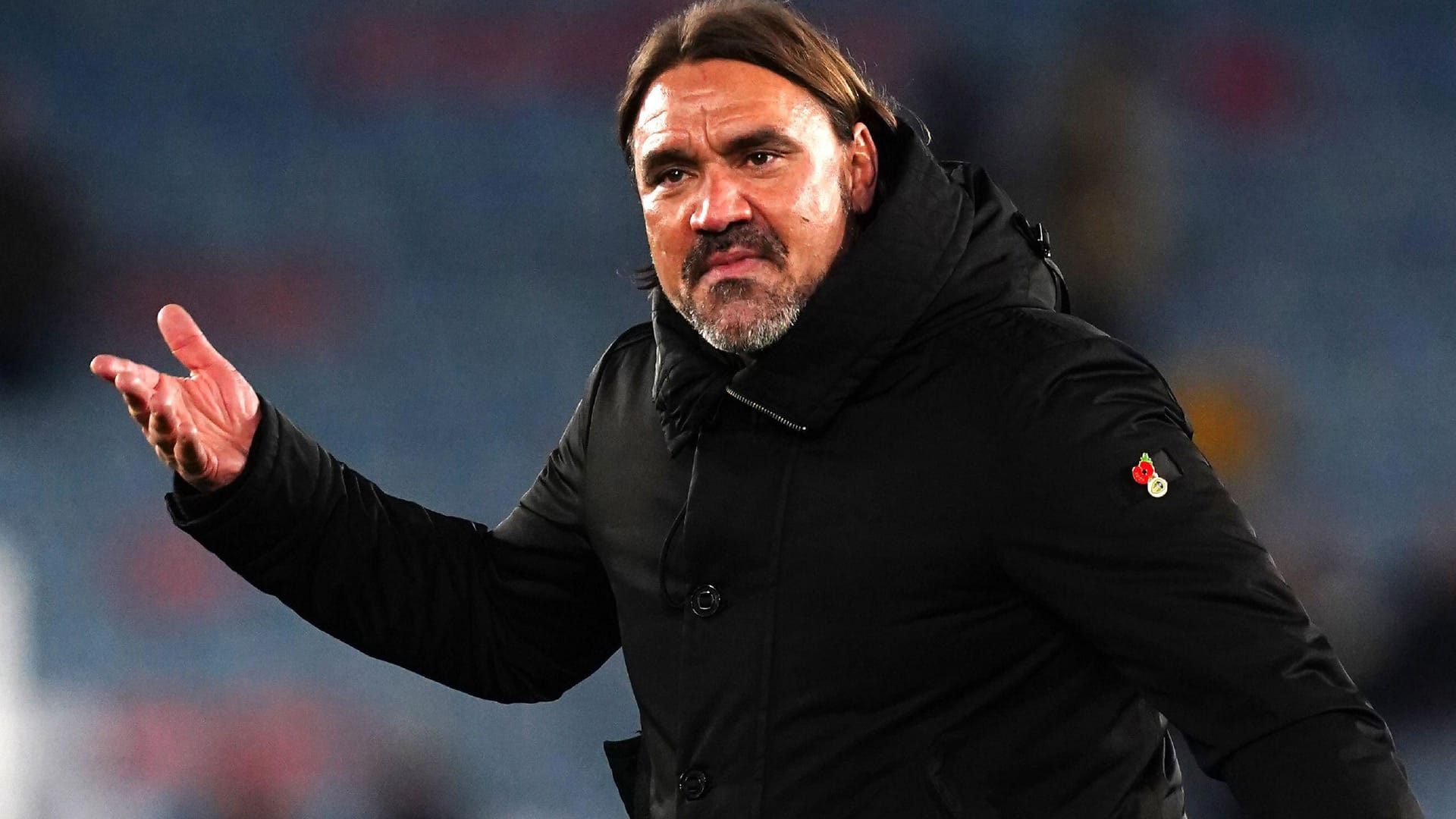 A photograph of Daniel Farke, kinda shrugging