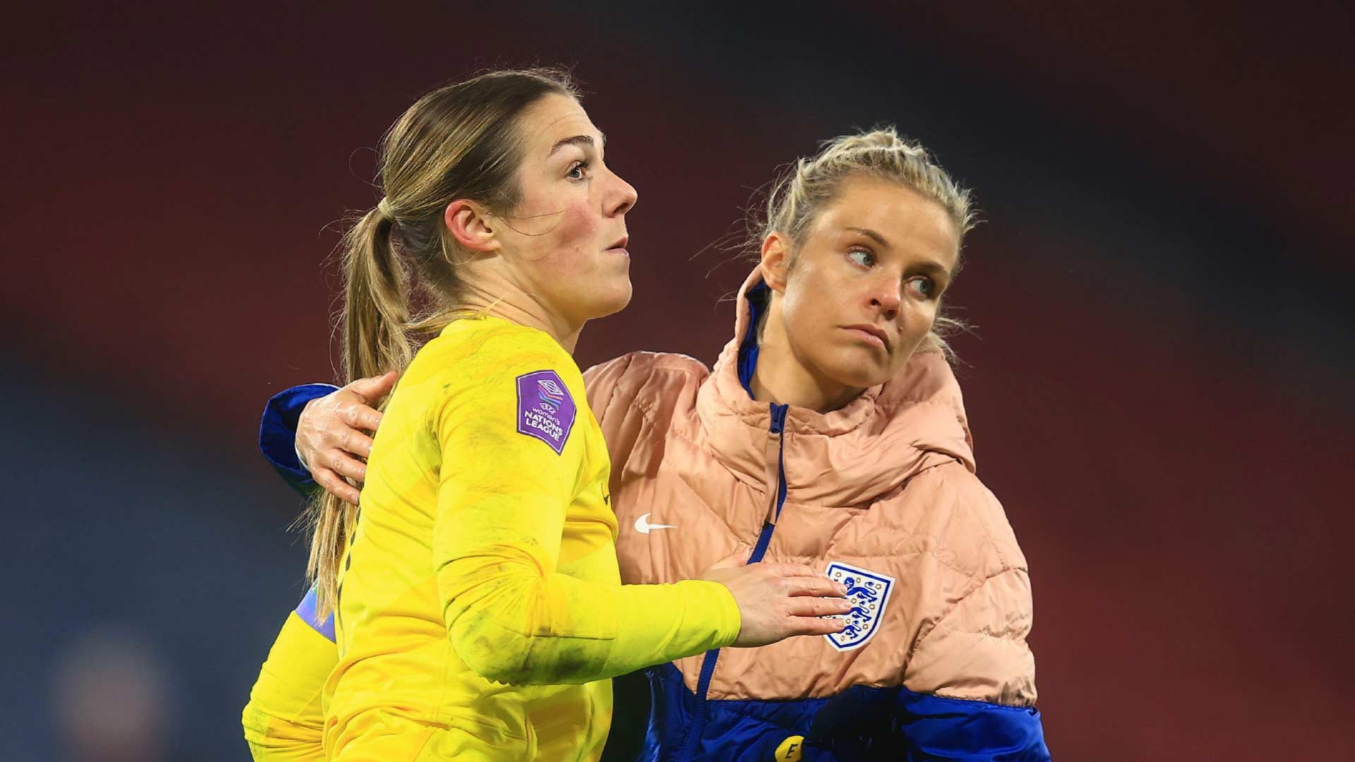 Leeds fan Rachel Daly consoling England 'keeper Mary Earps after the Lionesses missed out on qualifying for the Olympics
