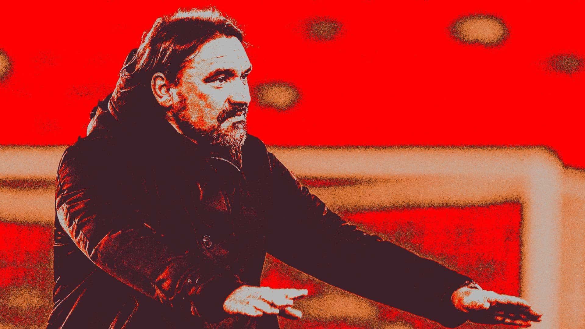 Daniel Farke preparing to salute the Leeds fans at the end of the game, but everything is red and distorted like something bad is about to happen in Twin Peaks