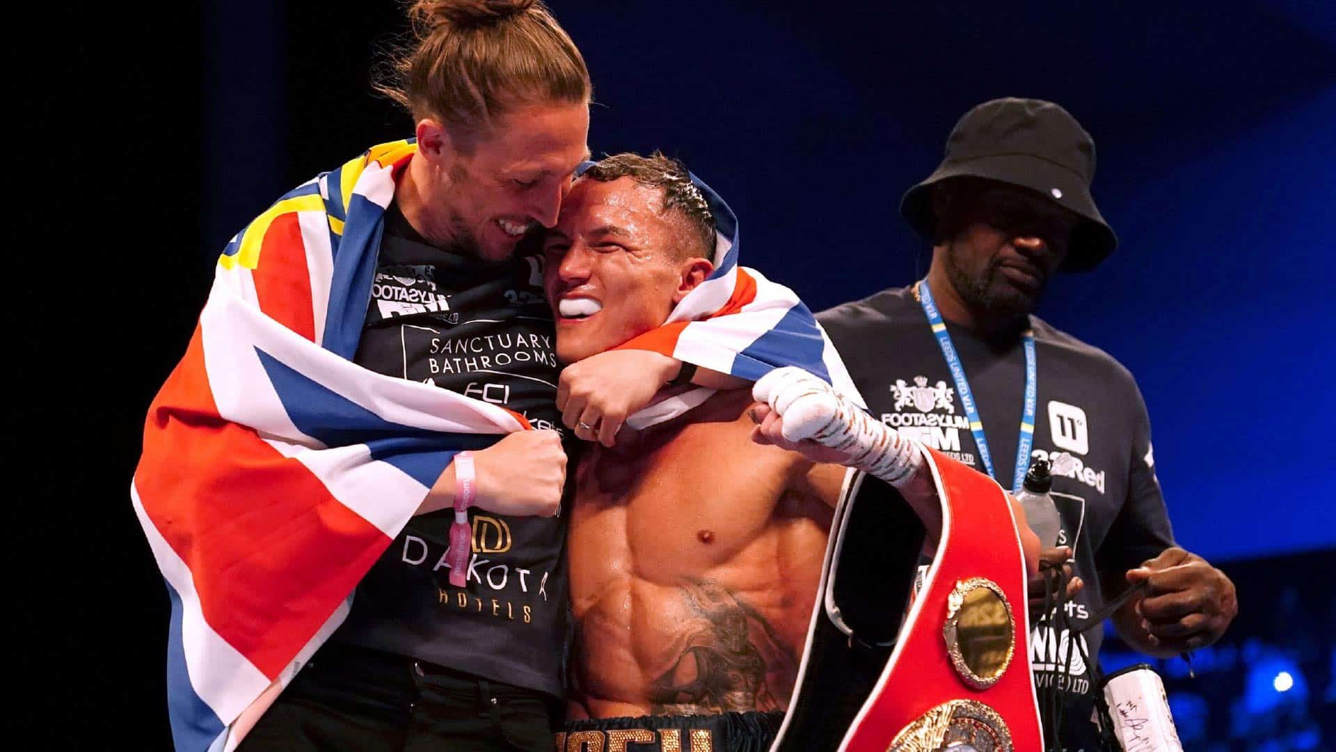 Luke Ayling squeezing Josh Warrington around the head after he won his last world title fight. Josh is grimacing, because Ayling doesn't realise he has a broken jaw