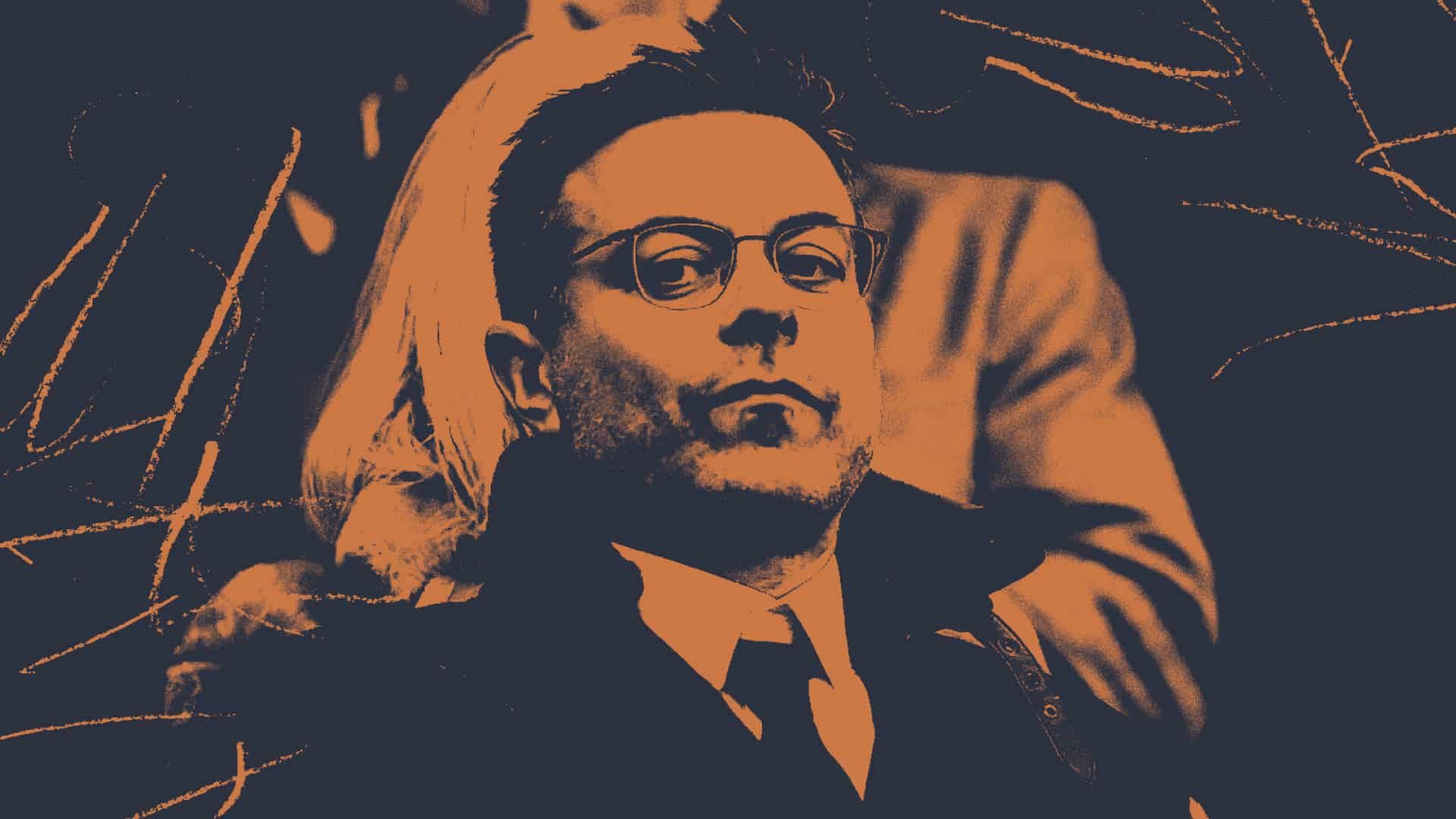 A photo of Andrea Radrizzani with a black and orange filter. It's as distressing as the third shirt