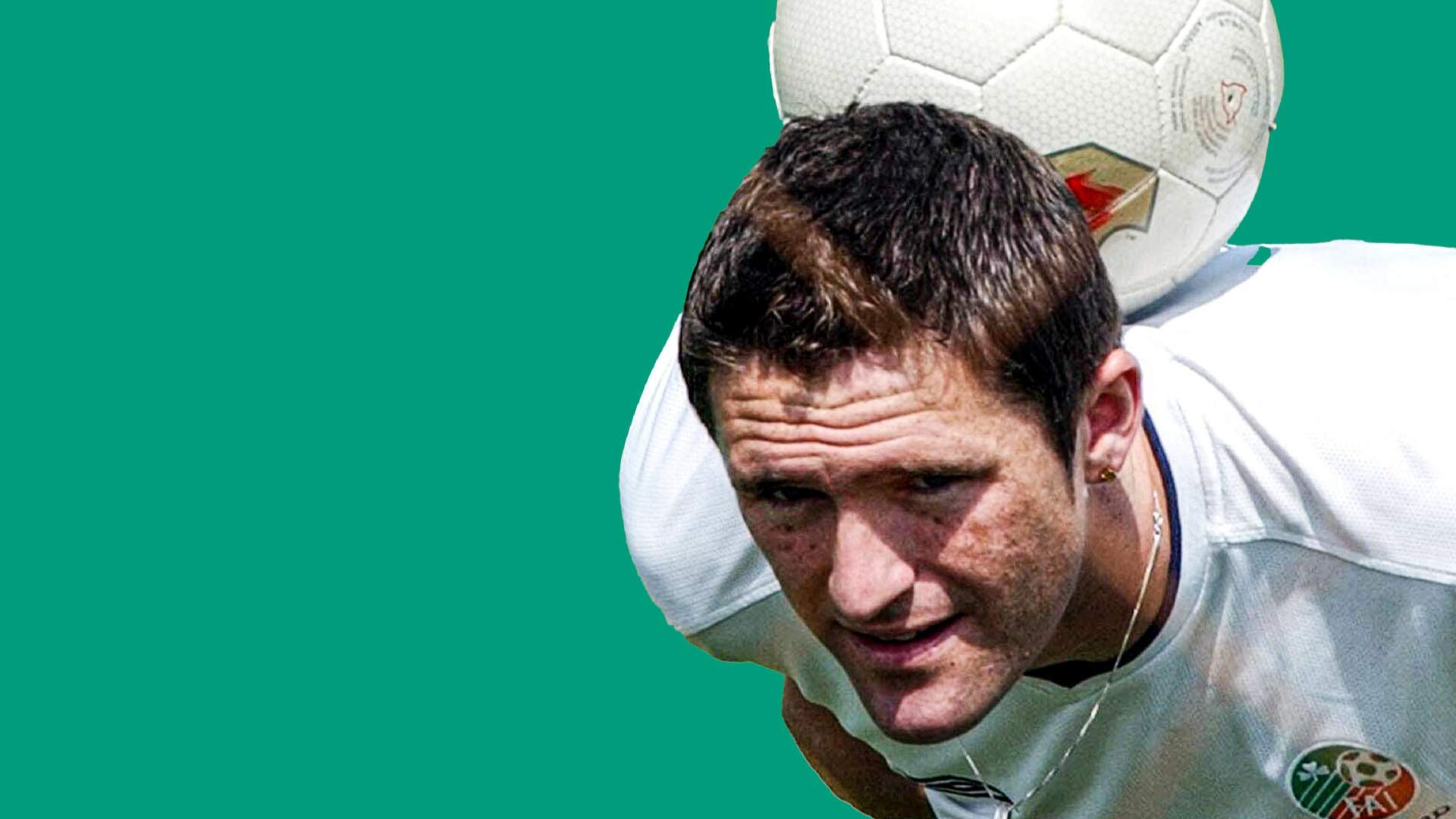 Robbie Keane balancing a 2002 World Cup ball on the back of his neck, because he's cool
